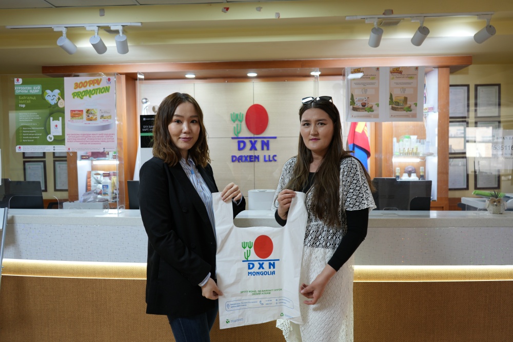 DXN Mongolia's big step toward sustainability; biodegradable, eco-friendly bags.